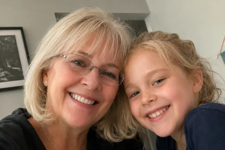 Carol with her granddaughter