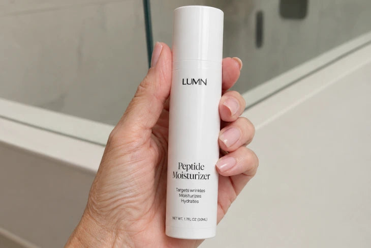 The LUMN Peptide Moisturizer — a dime-sized amount after the session