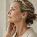 A jawline that's softening, or jowls / a "turkey neck"